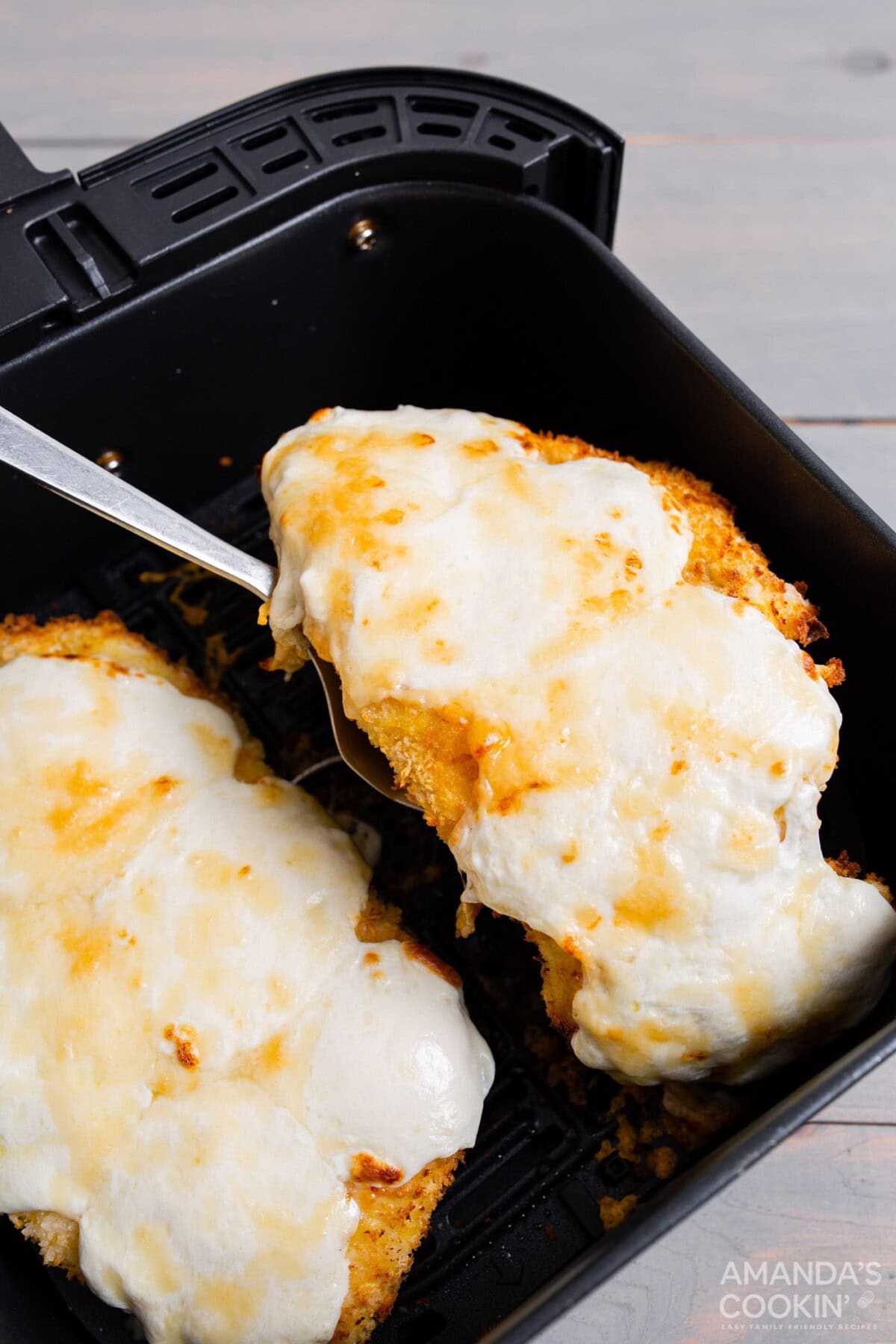 removing chicken parmesan from the air fryer