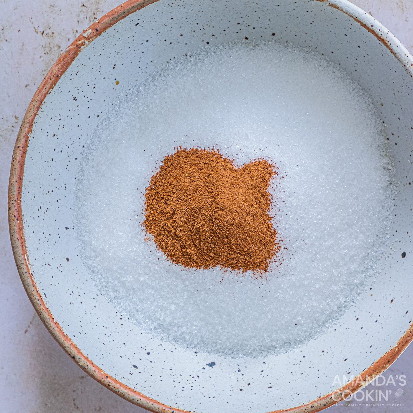 cinnamon and sugar in shallow bowl