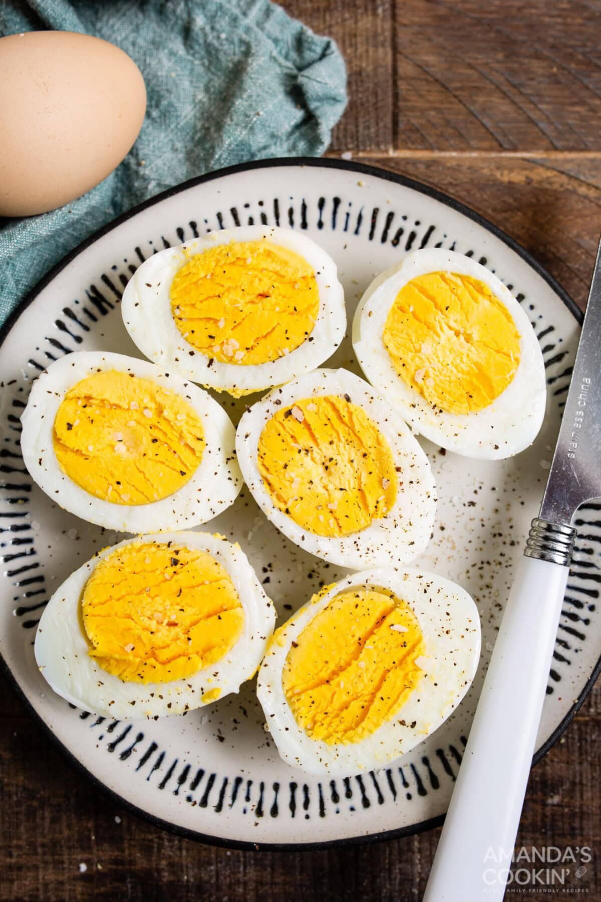 halved hard boiled eggs on a plate