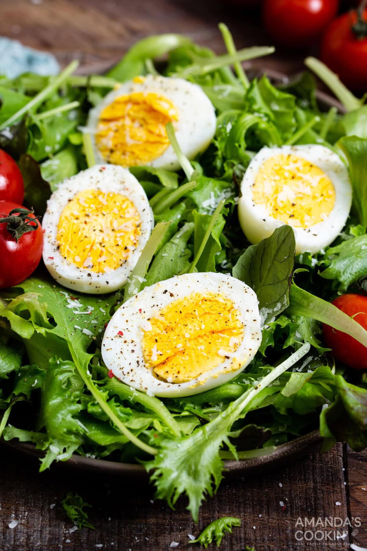 sliced hard boiled eggs on a salad