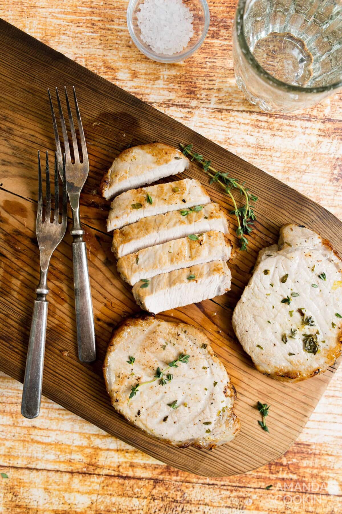 pork chops on a cutting board