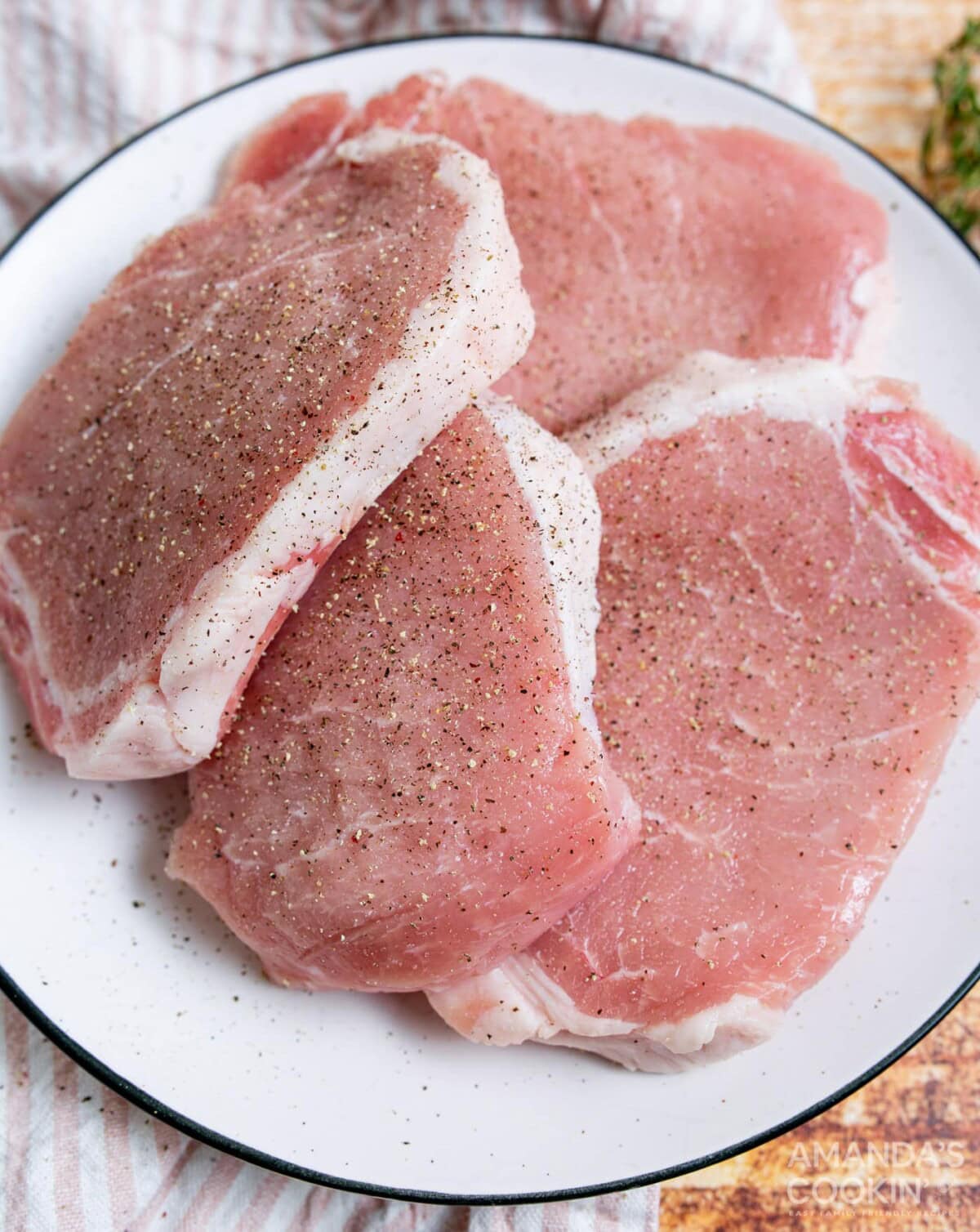 salt and pepper on pork chops