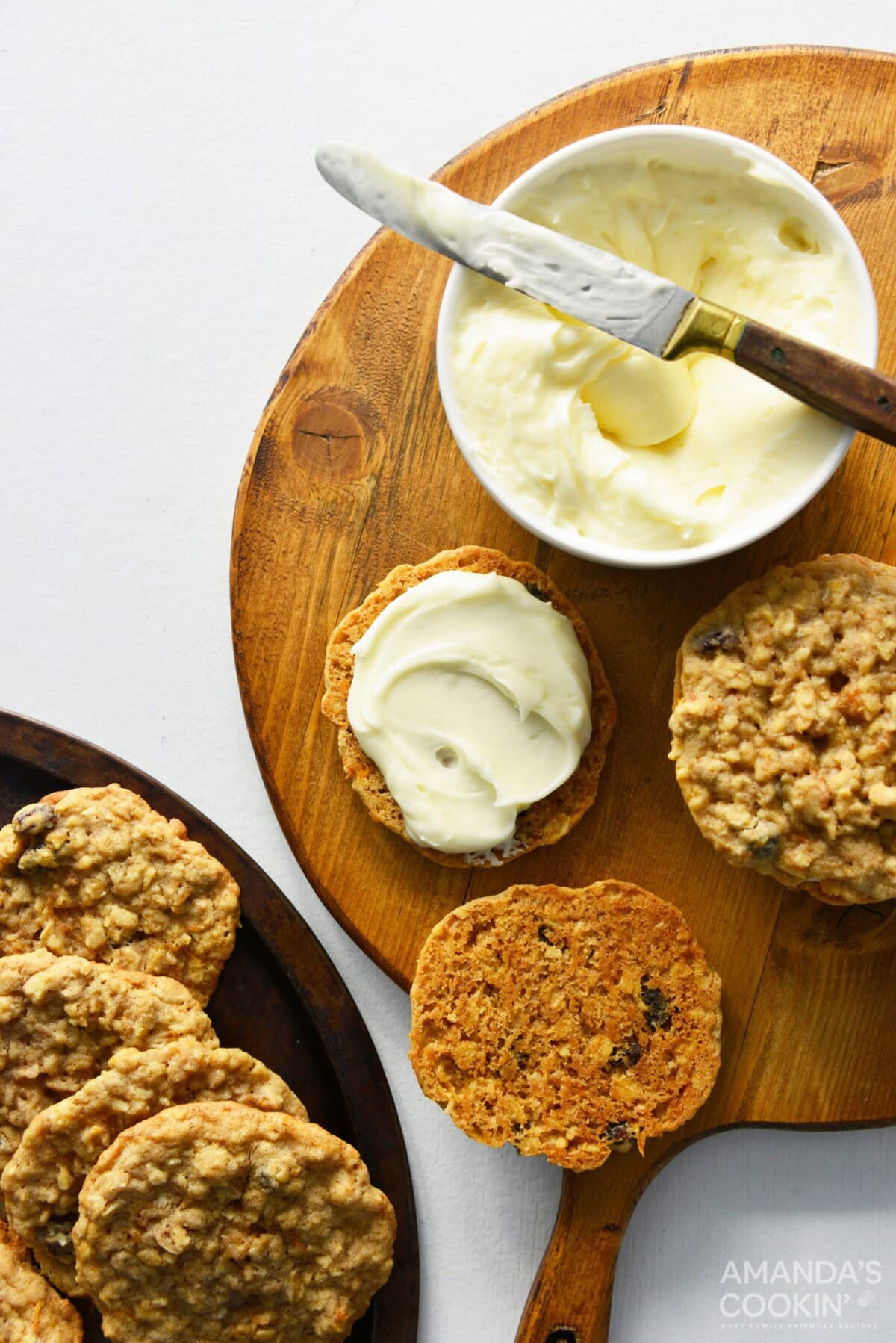 spreading frosting on a cookie