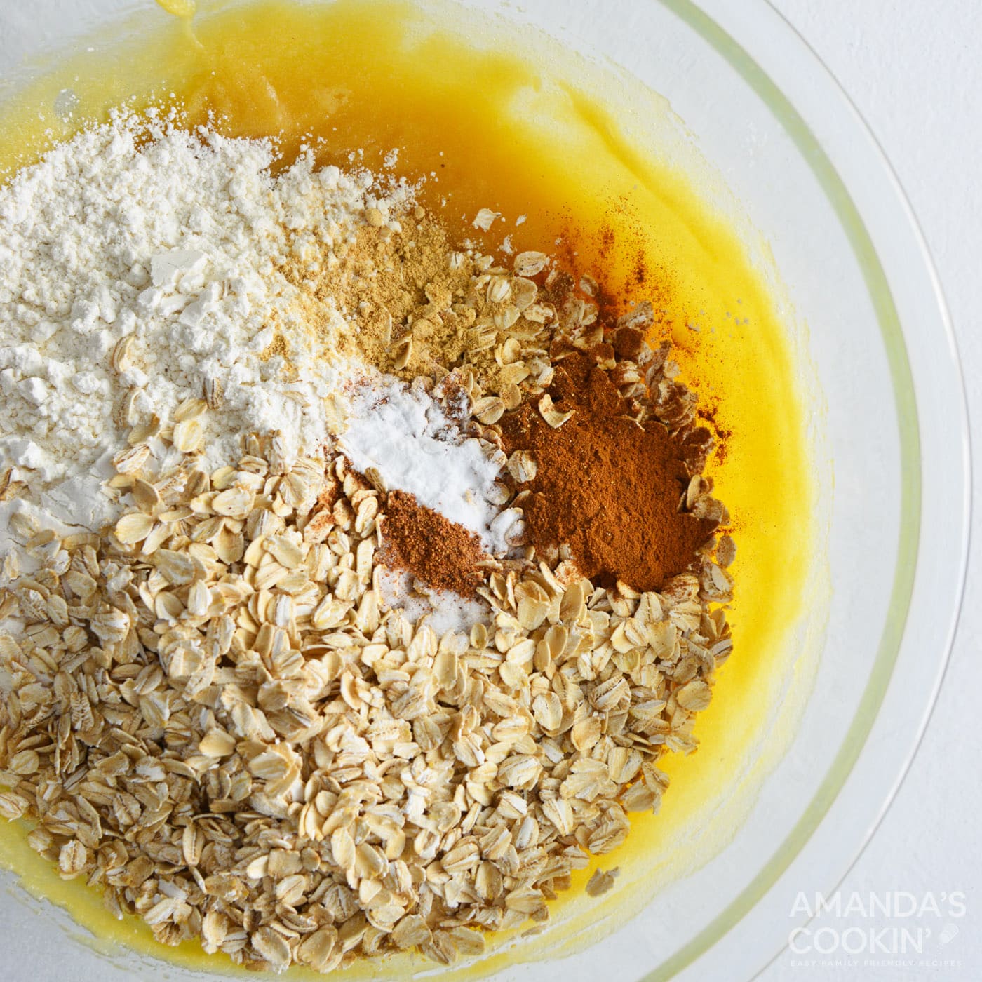 oats, flour, and spices added to mixing bowl