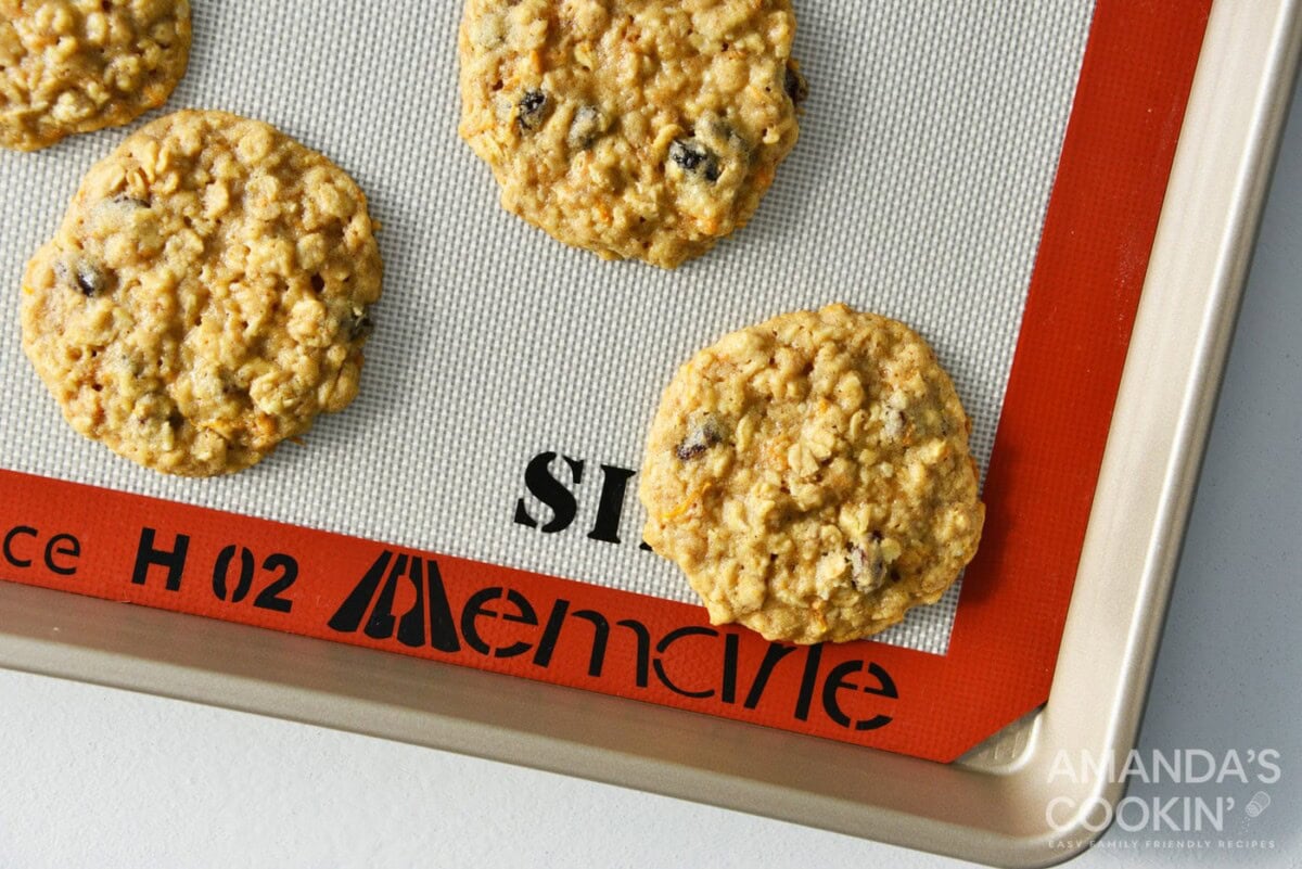 baked carrot cake cookies on a tray