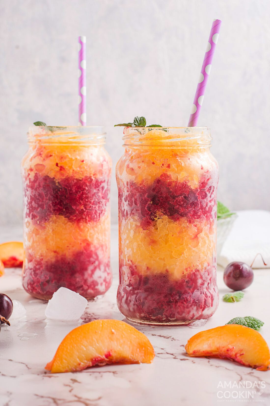 layered cherry peach slushies in jars