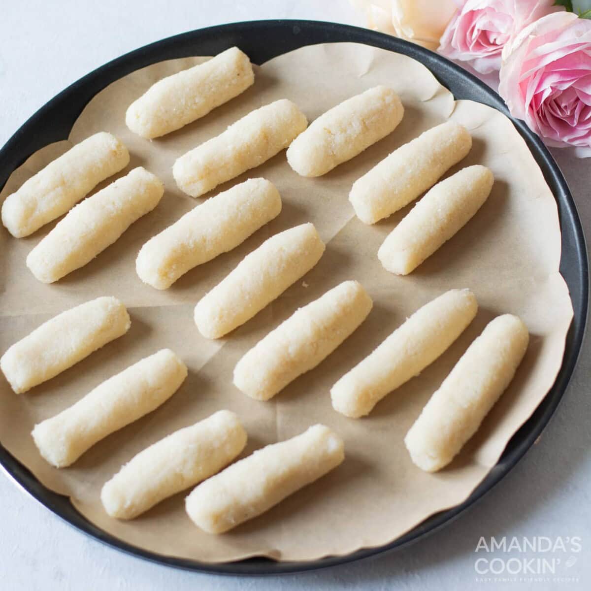 rolled coconut filling on parchment paper