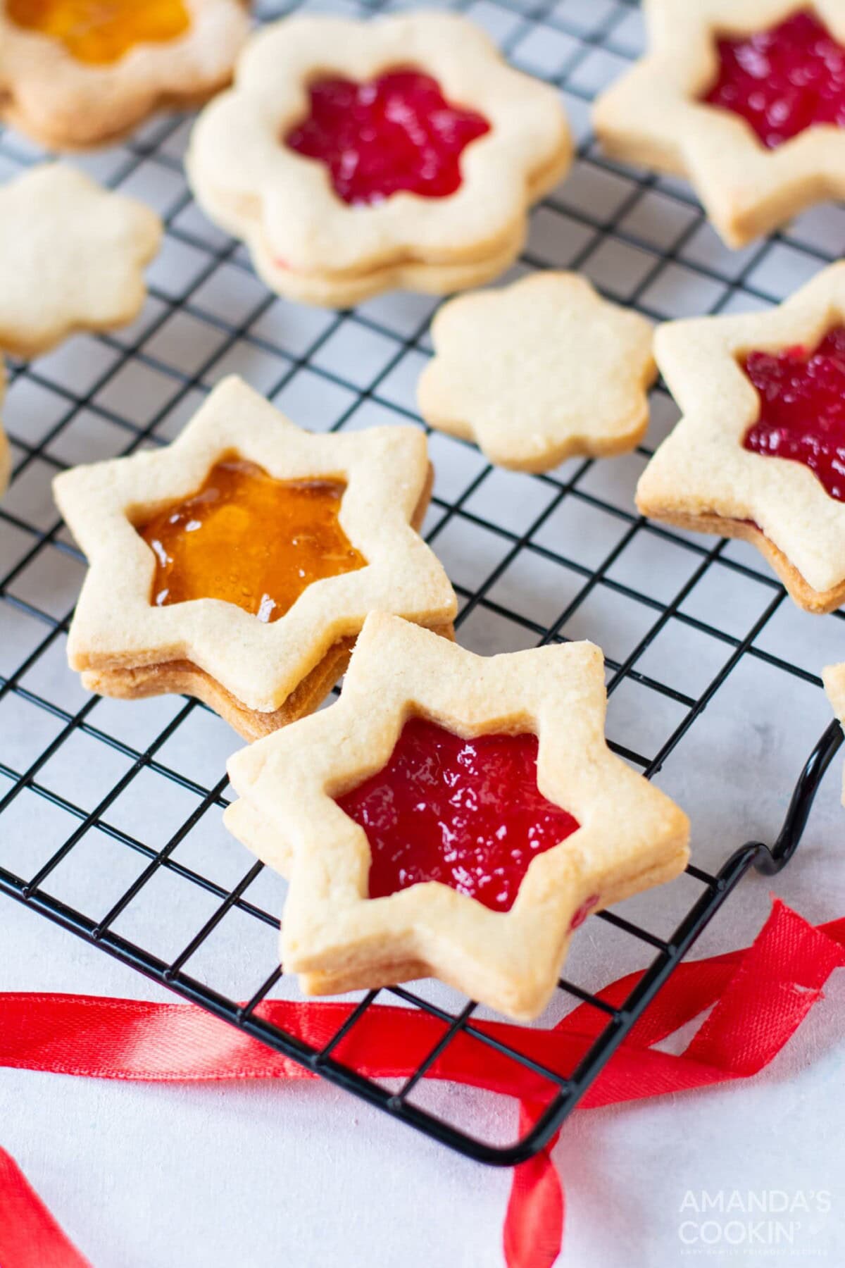 linzer cookies on a wire rack