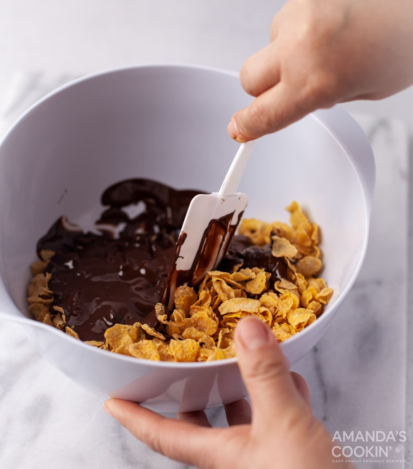 stirred melted chocolate into cornflakes