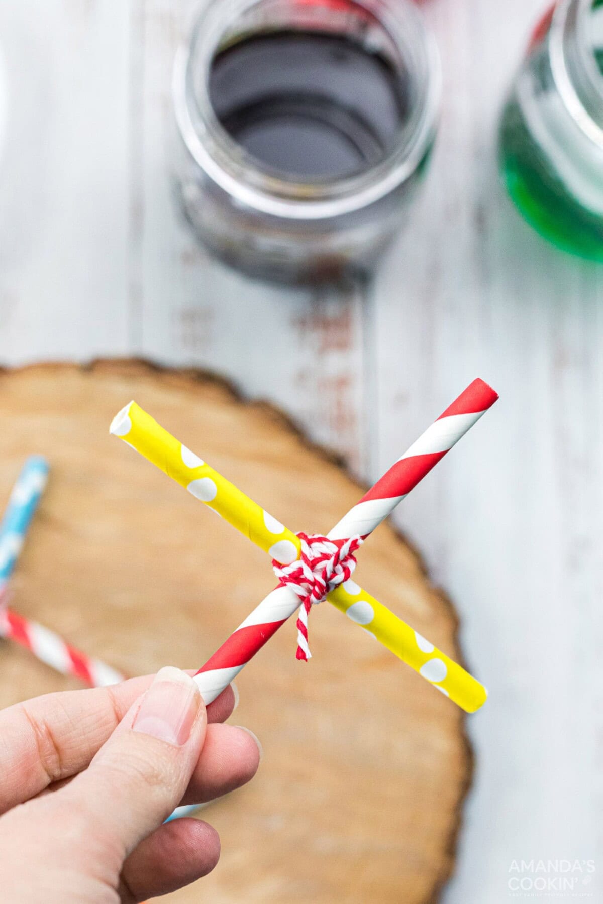 two straws tied together