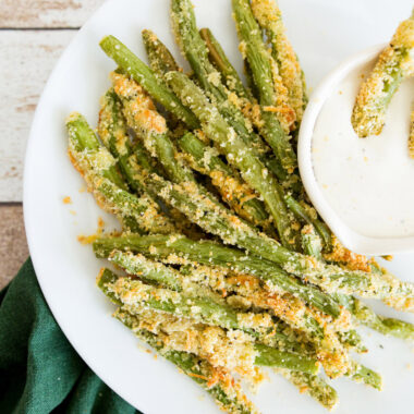 Air Fryer Green Bean Fries on a plate with dip