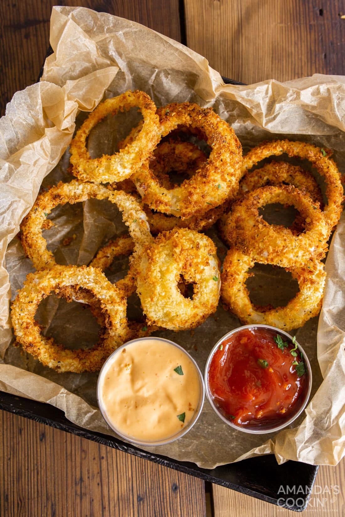 Air Fryer Onion Rings in a tray on parchment