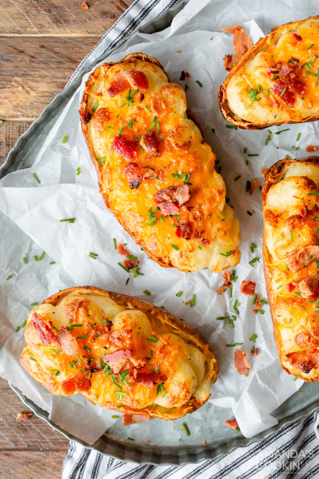Air Fryer Twice Baked Potatoes on parchment paper