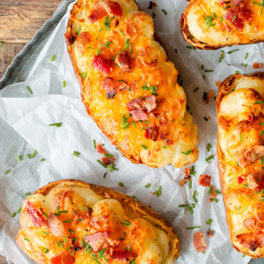 Air Fryer Twice Baked Potatoes on parchment paper