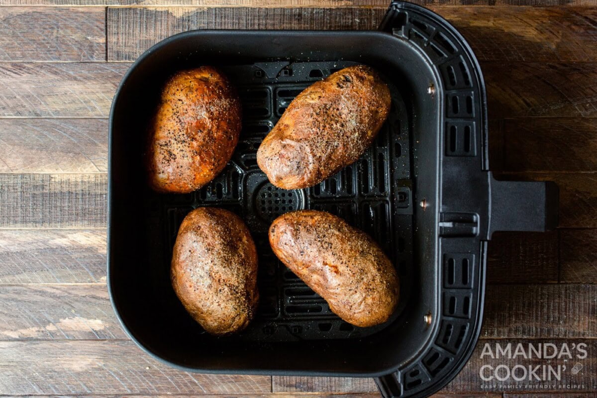 cooked russet potatoes in an air fryer basket