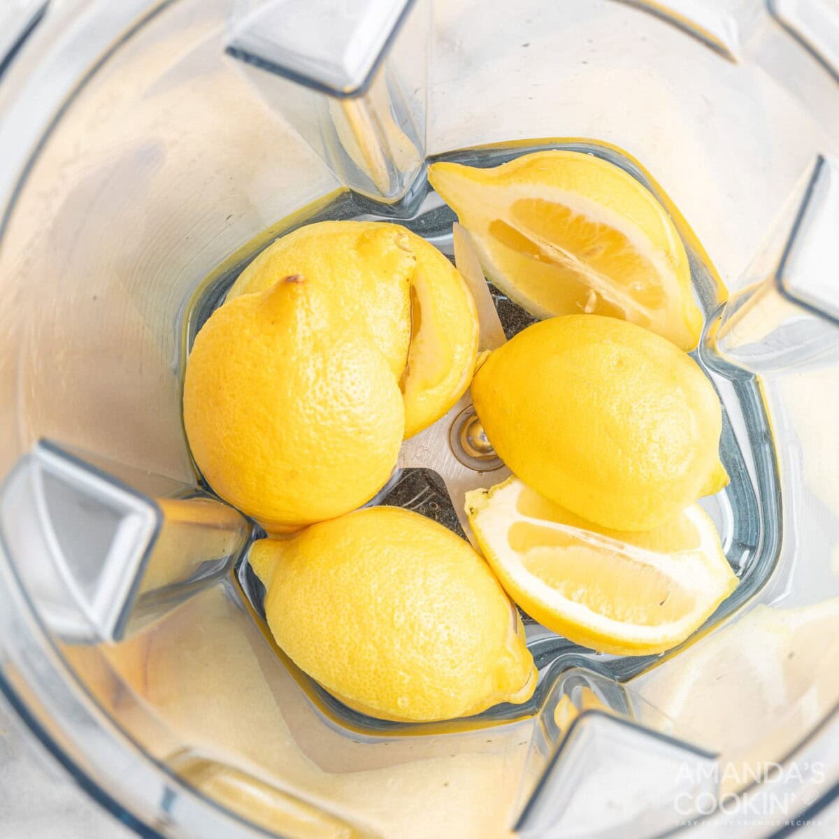 halved lemons in a blender