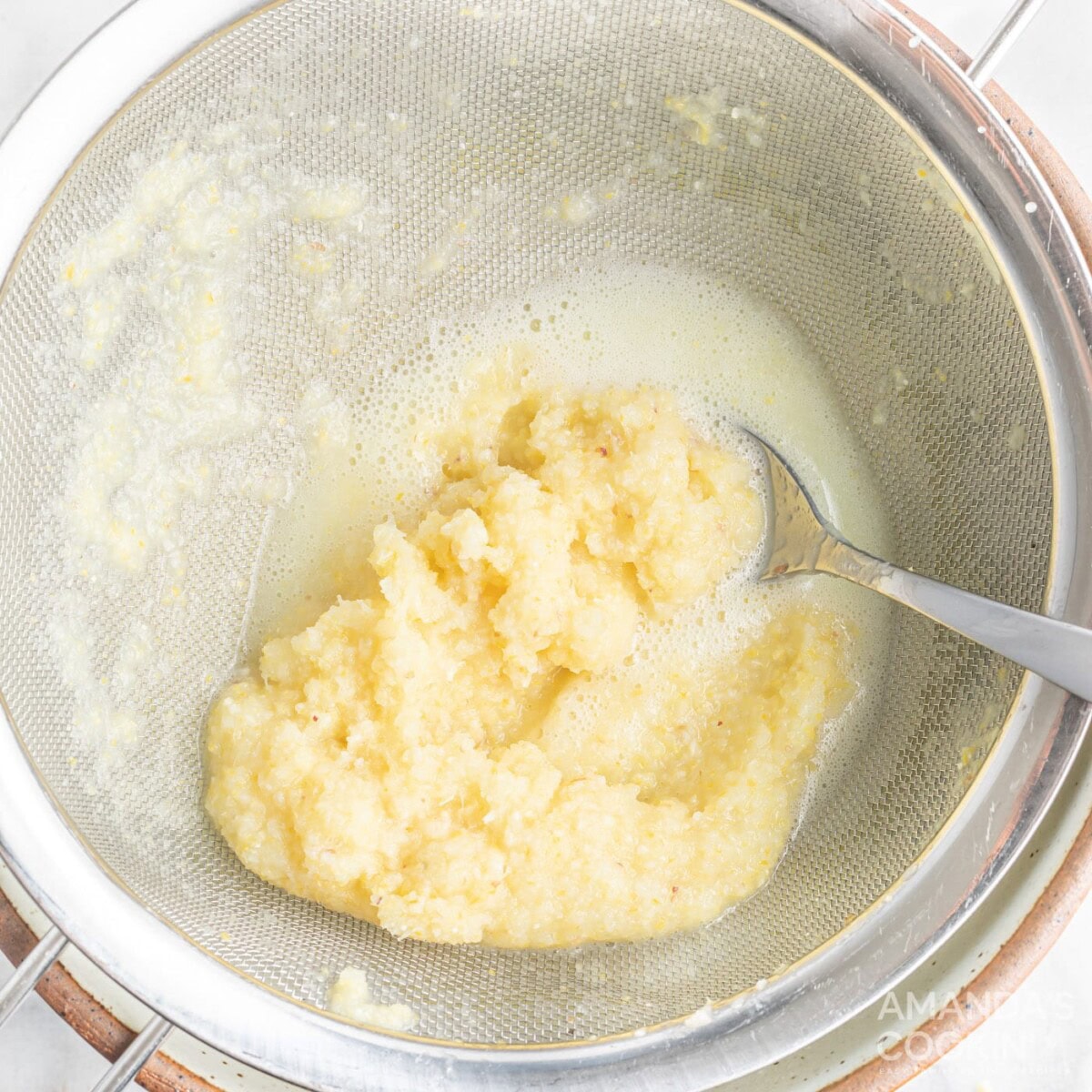 lemon pulp in a strainer