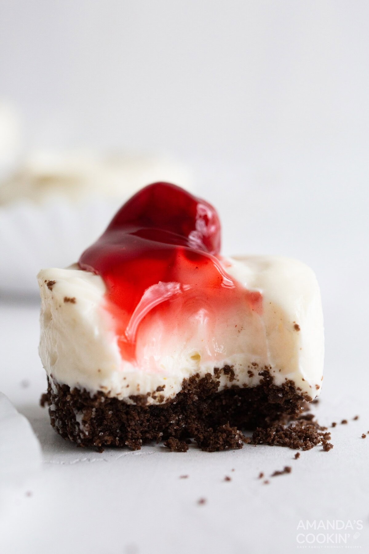 mini cheesecake with a bite out of it