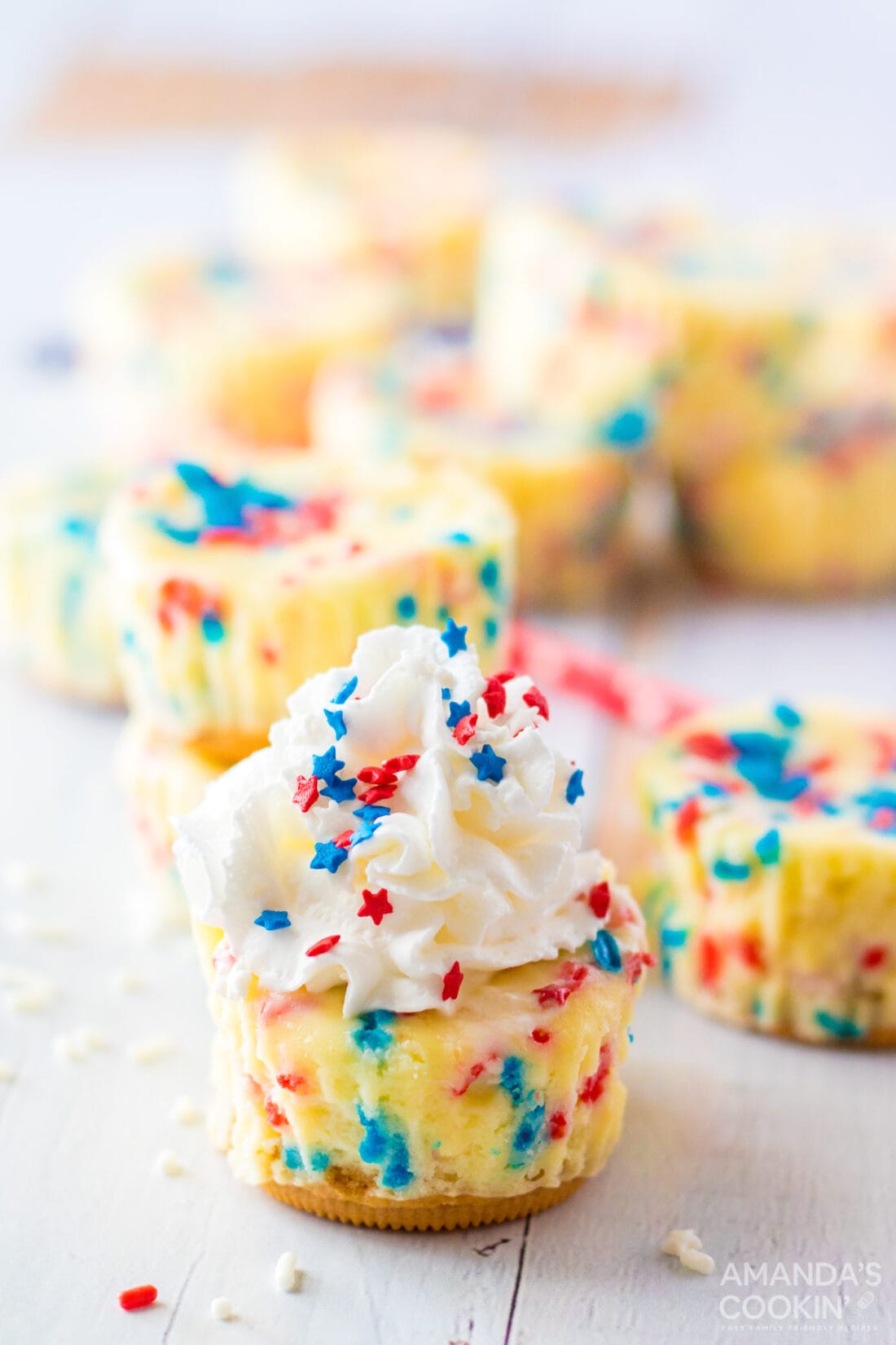 Patriotic Mini Cheesecake with whipped cream and sprinkles