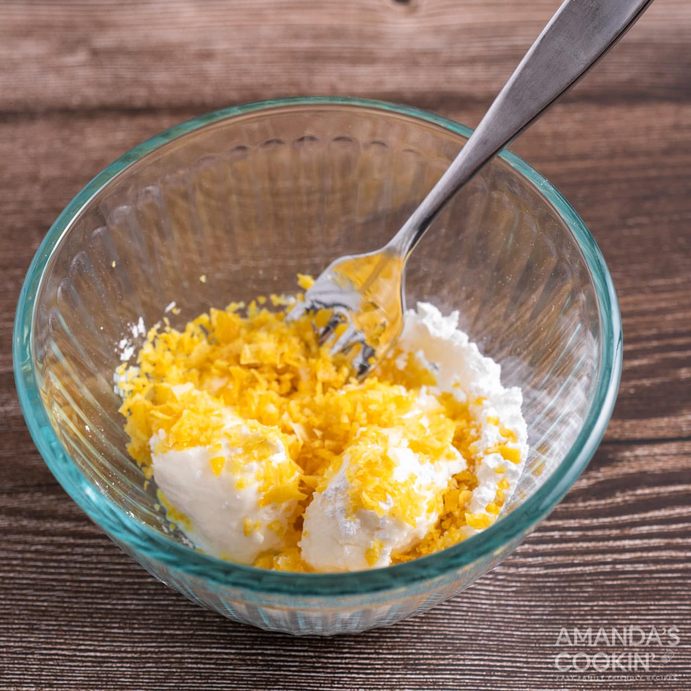 cream cheese, powdered sugar, and lemon zest in a bowl
