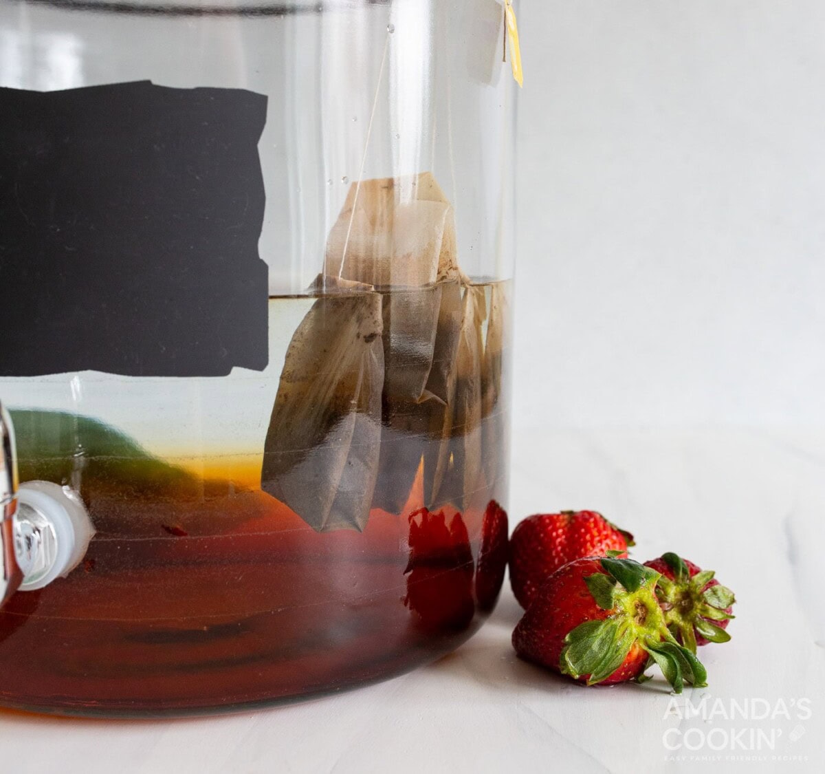 Tea bags on the side of a pitcher