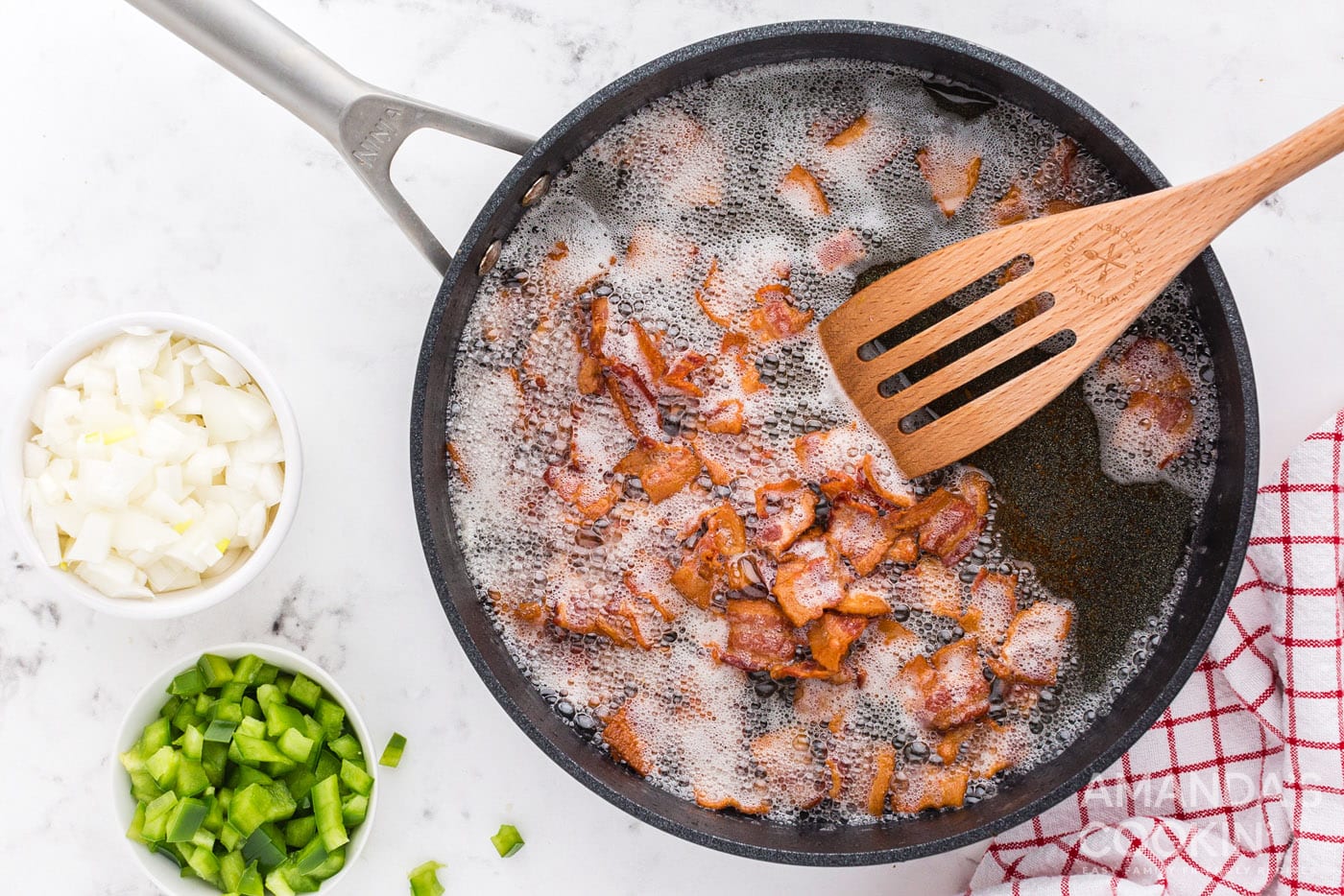 bacon cooking in skillet
