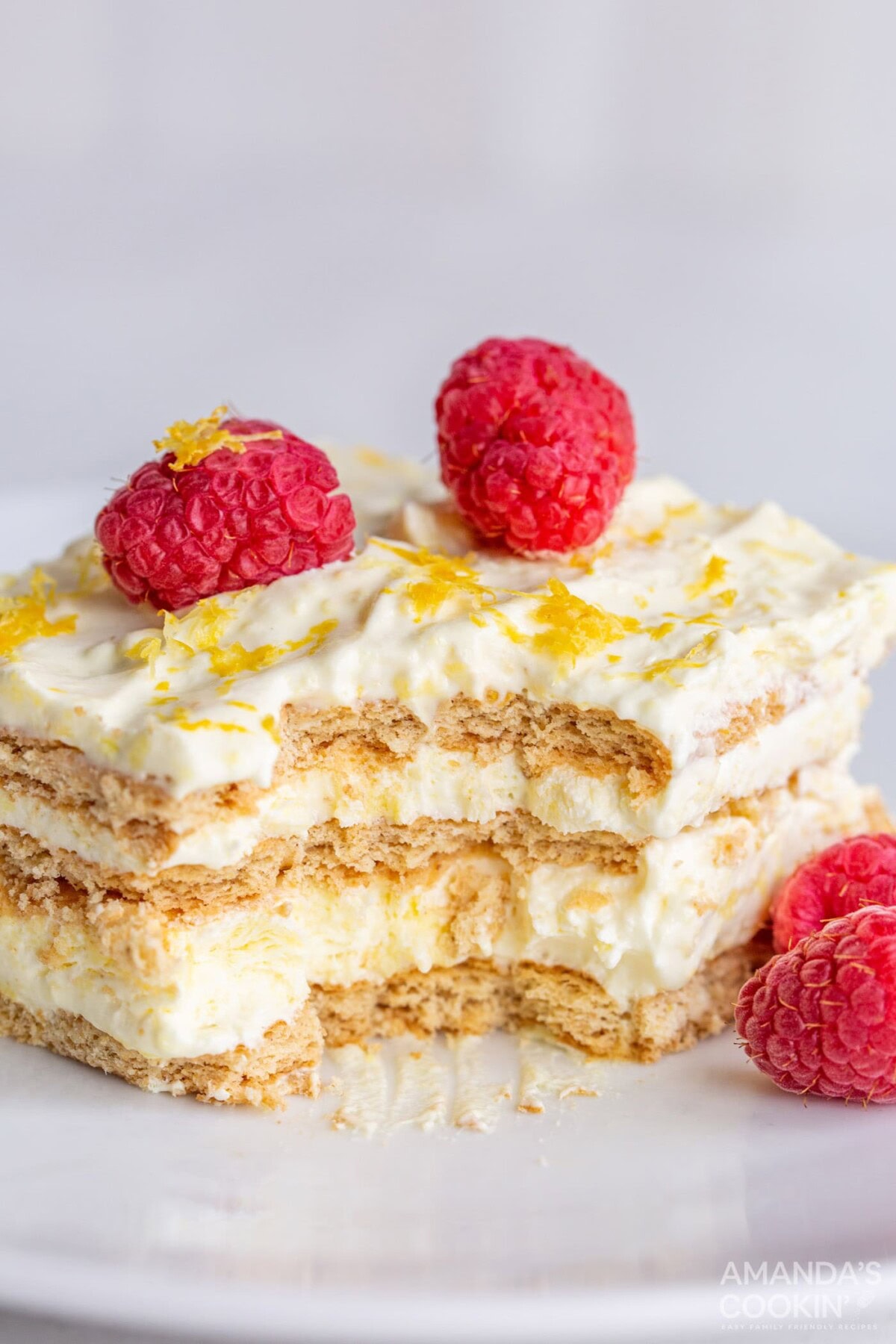 lemon icebox cake with bites out of it