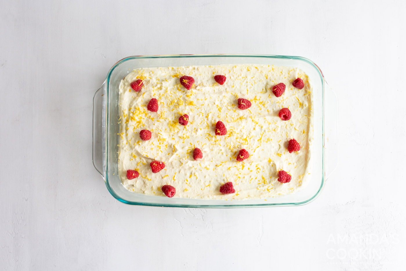 lemon icebox cake overhead shot with raspberries