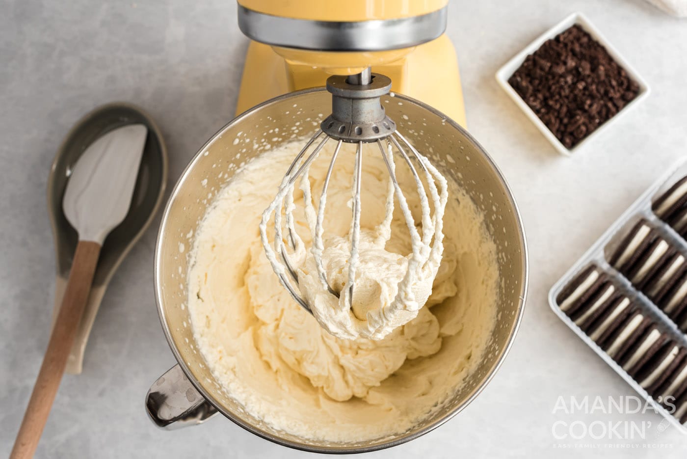 cream, powdered sugar, and vanilla in a stand mixer bowl