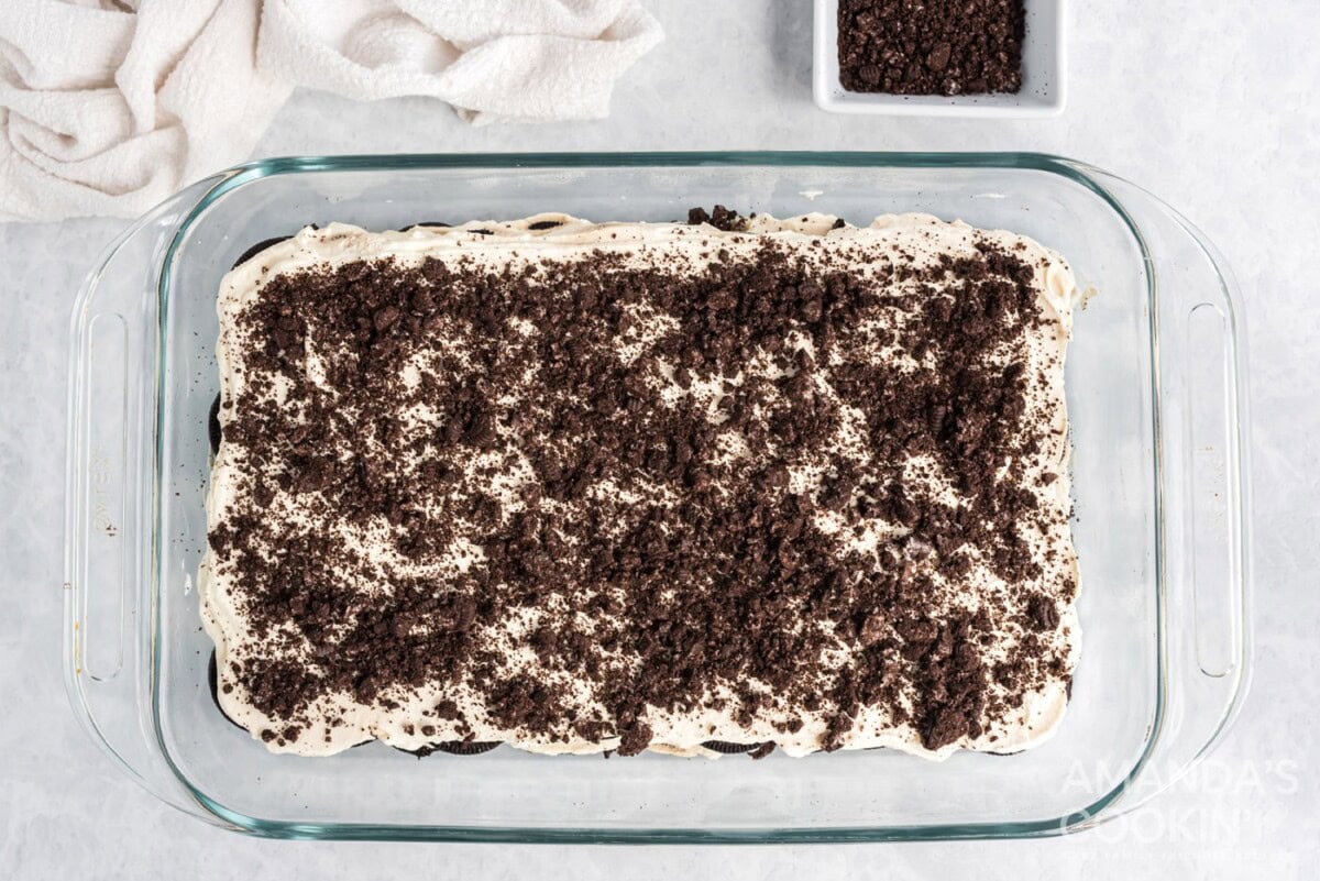 crushed Oreos on top of oreo icebox cake
