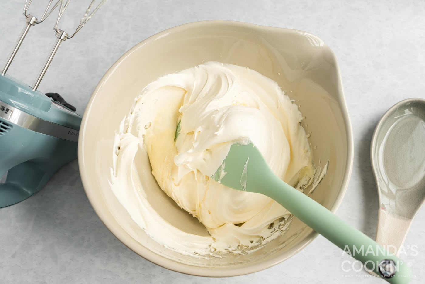 folding in whipped topping to cream cheese mixture