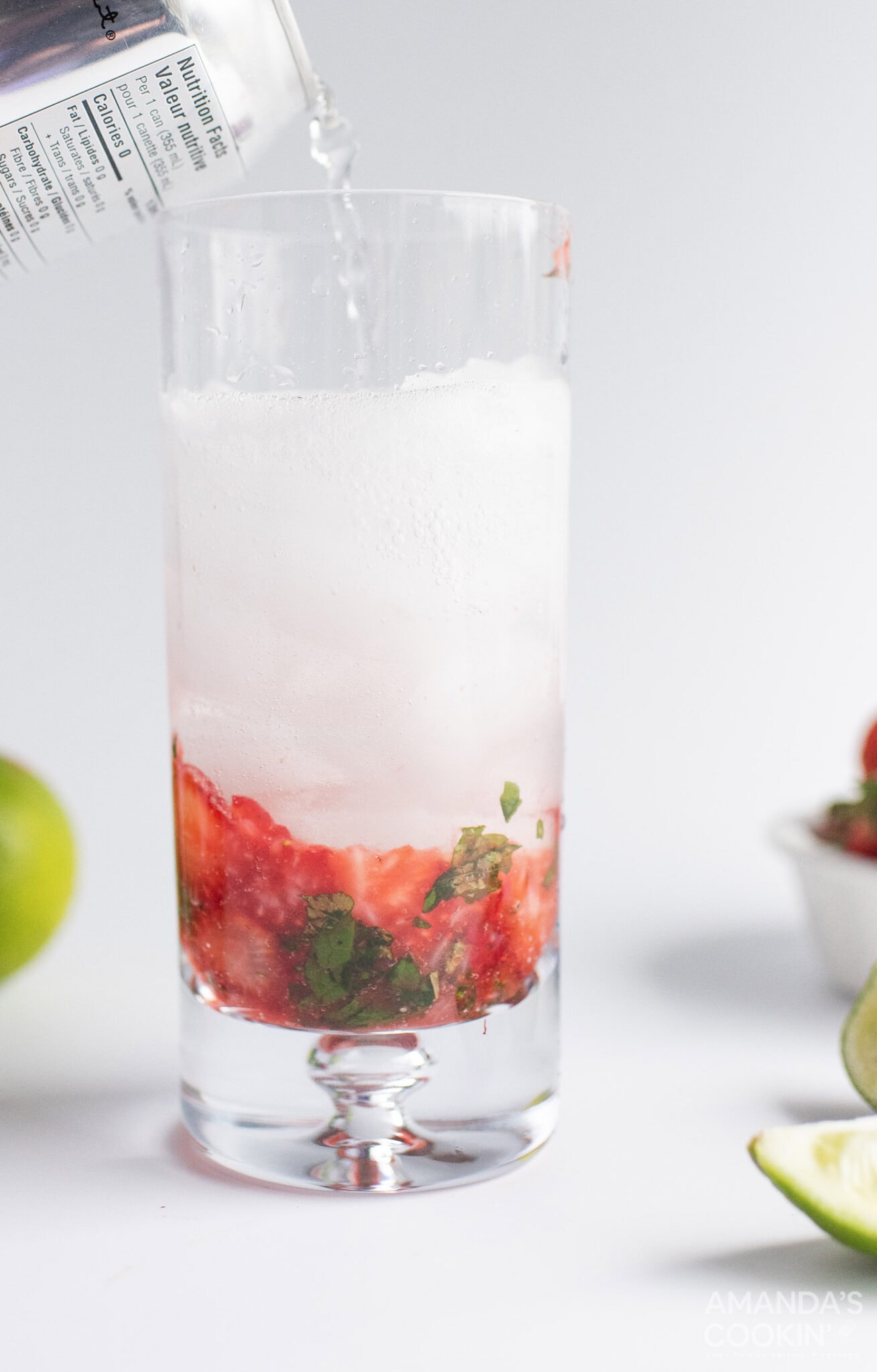 pouring club soda over ice