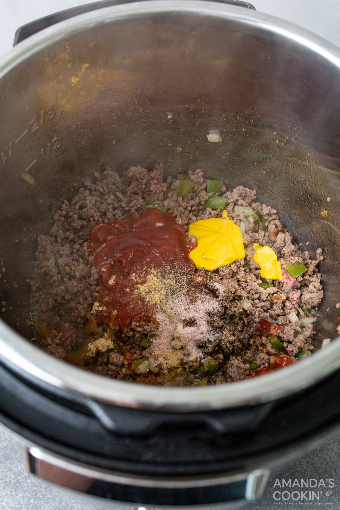 stir in seasonings and sauce ingredients with ground beef in the instant pot