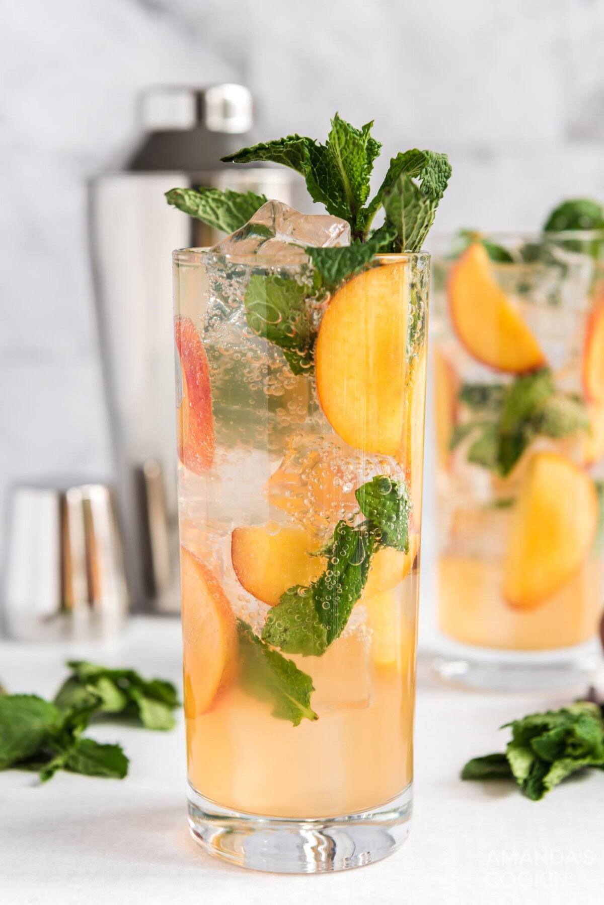 peach mojito in a tall glass