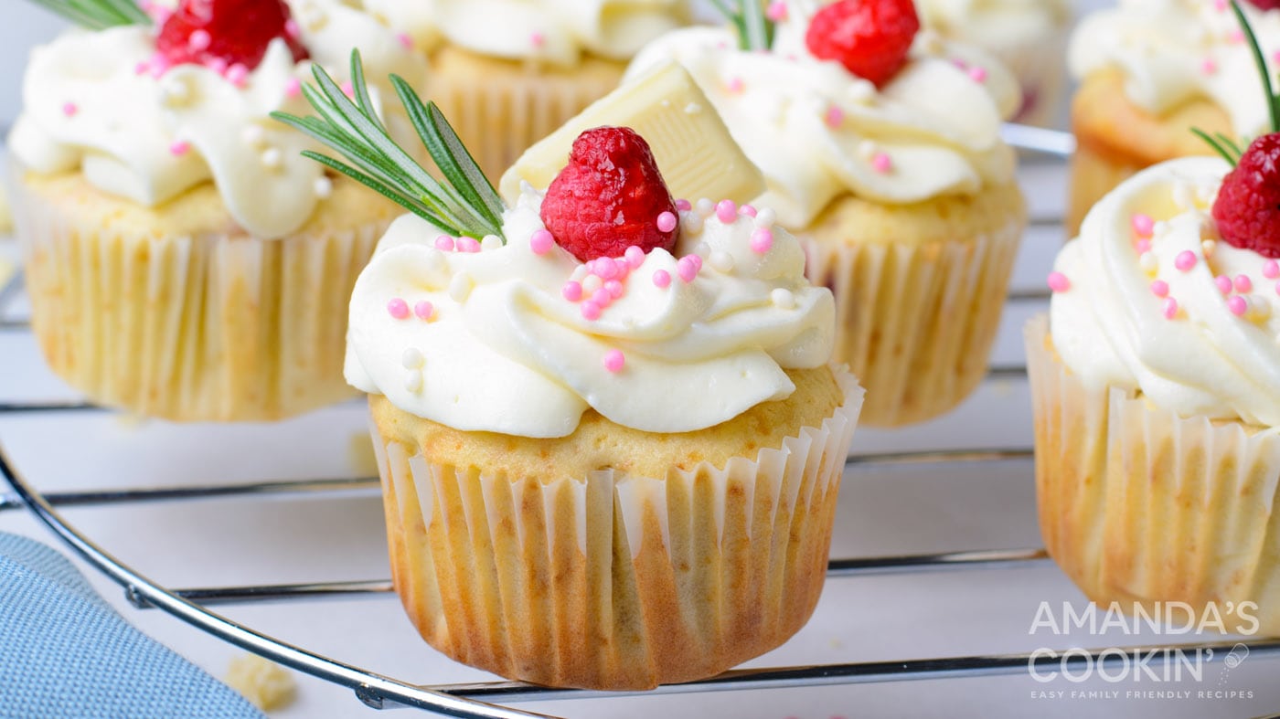 Delicious white cupcakes filled with raspberry and topped with white chocolate buttercream.