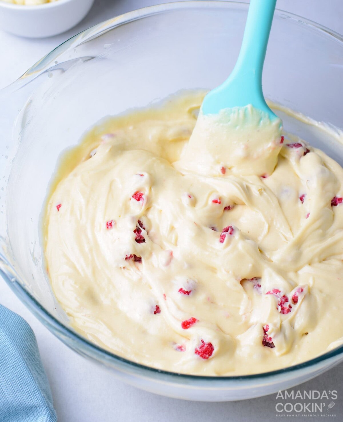 cupcake batter with raspberries