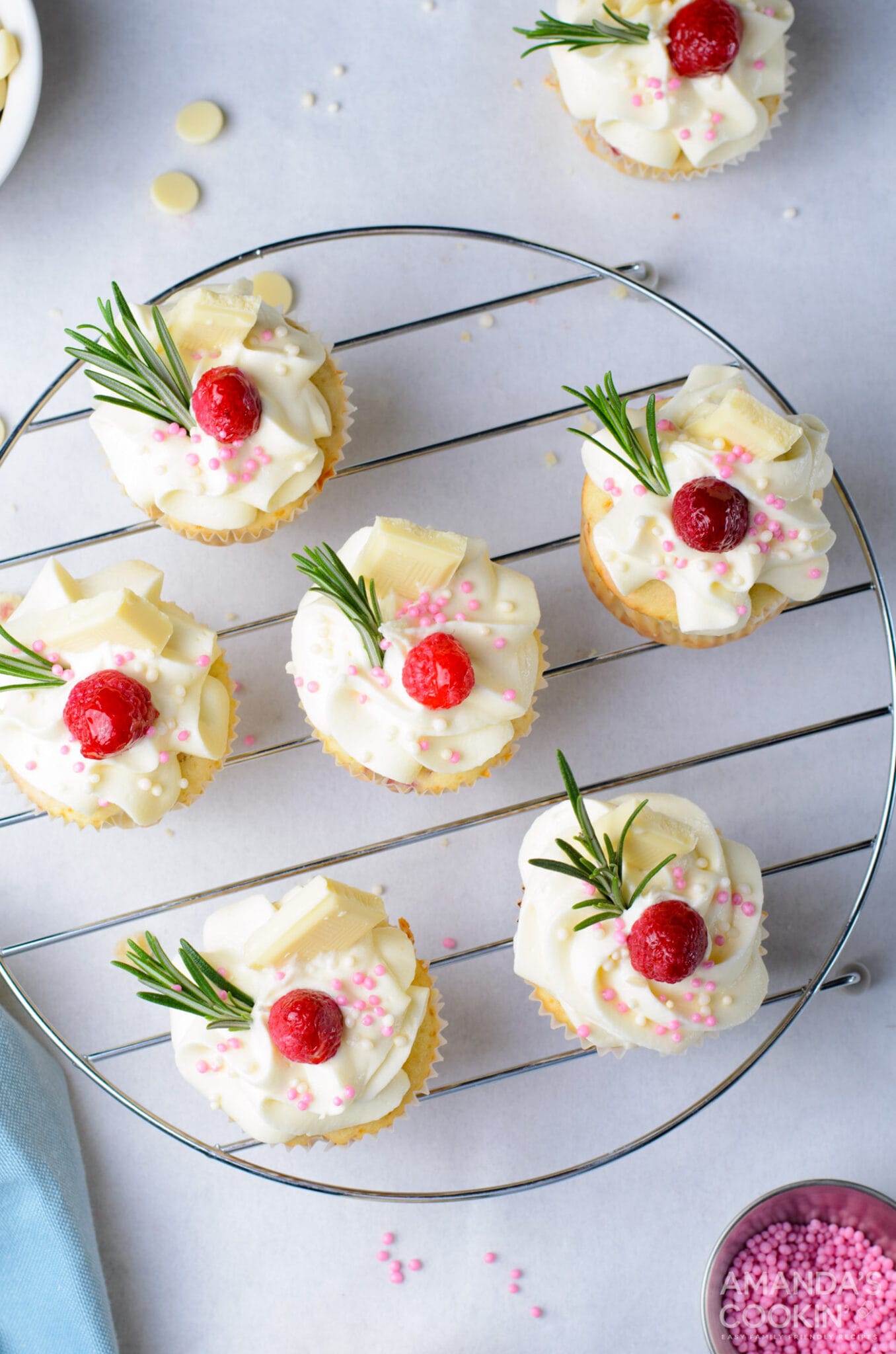overhead photo of Raspberry White Chocolate Cupcakes on a rack