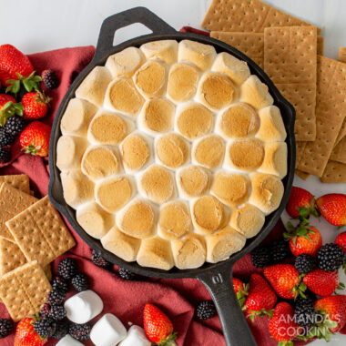smores dip in a cast iron skillet