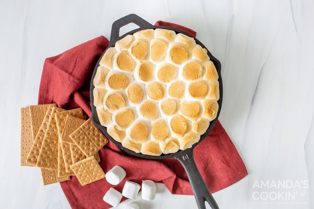smores dip in a cast iron skillet overhead shot