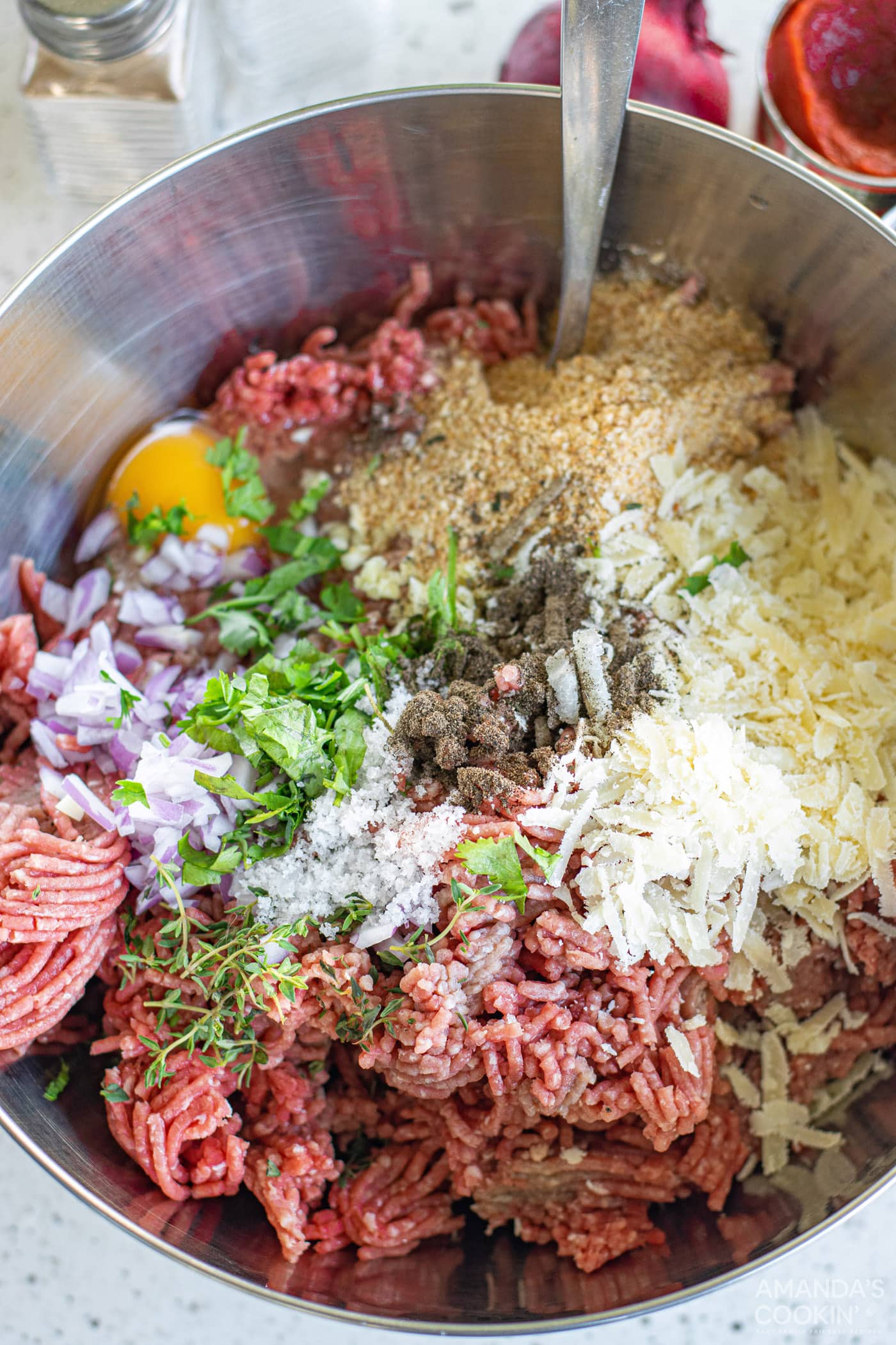 Meatball ingredients in a mixing bowl
