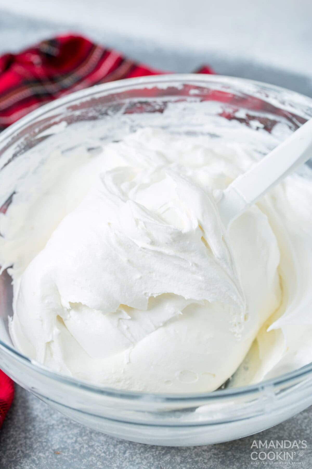 cream cheese, whipped topping and marshmallow fluff in a bowl