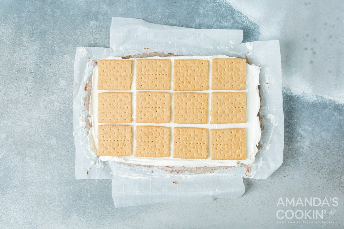 graham crackers on top of frozen smores layers