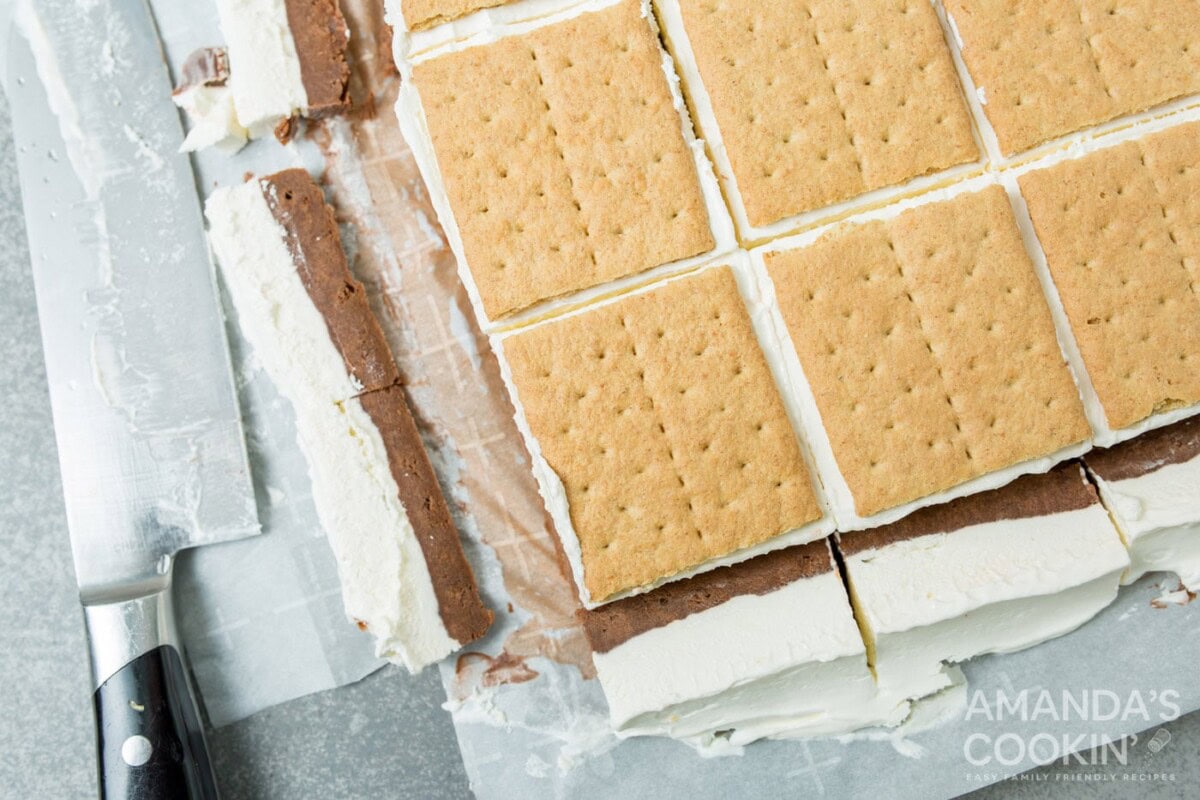 excess chocolate pudding and marshmallow layers cut off of graham crackers