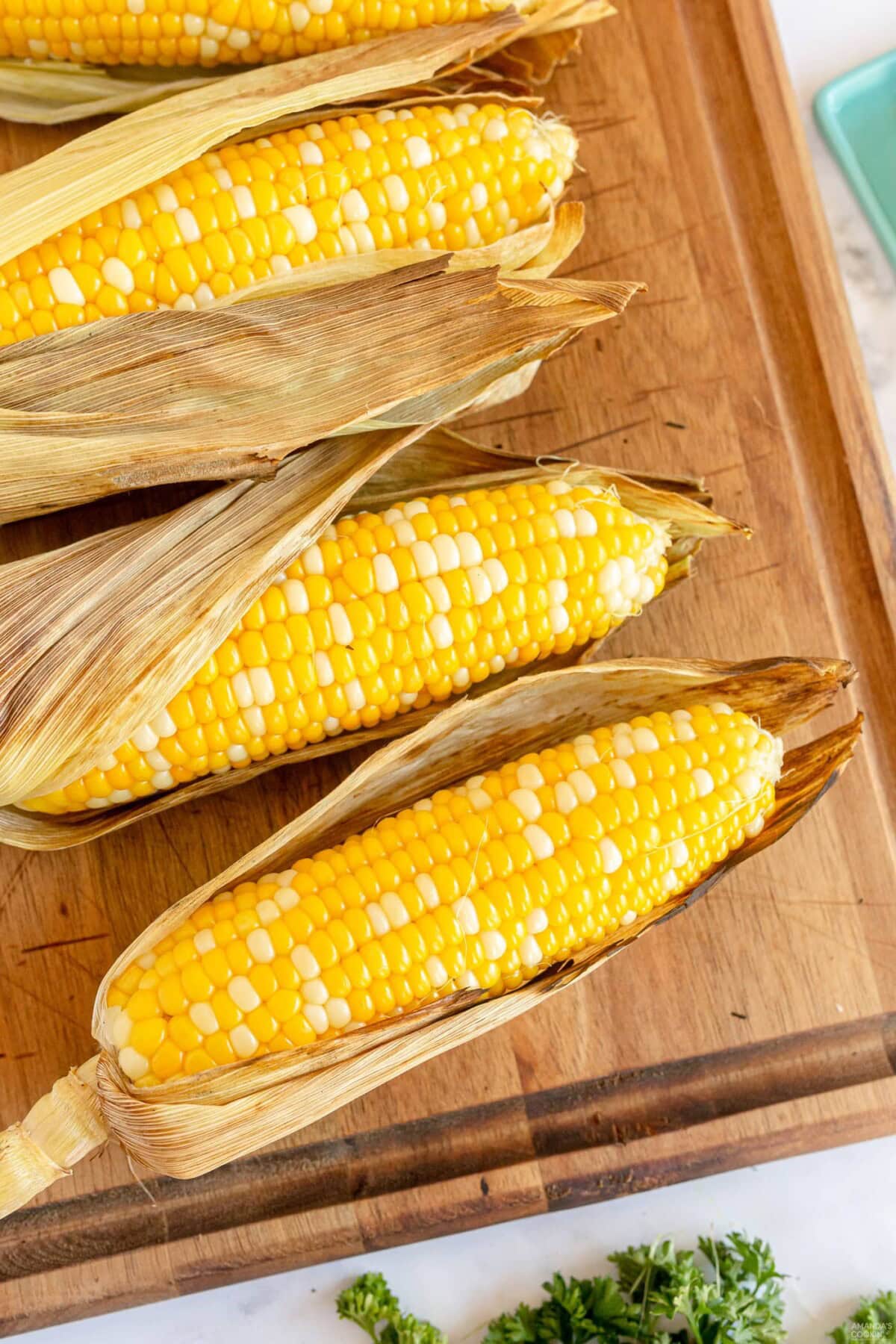 Grilled Corn on the Cob with husks on