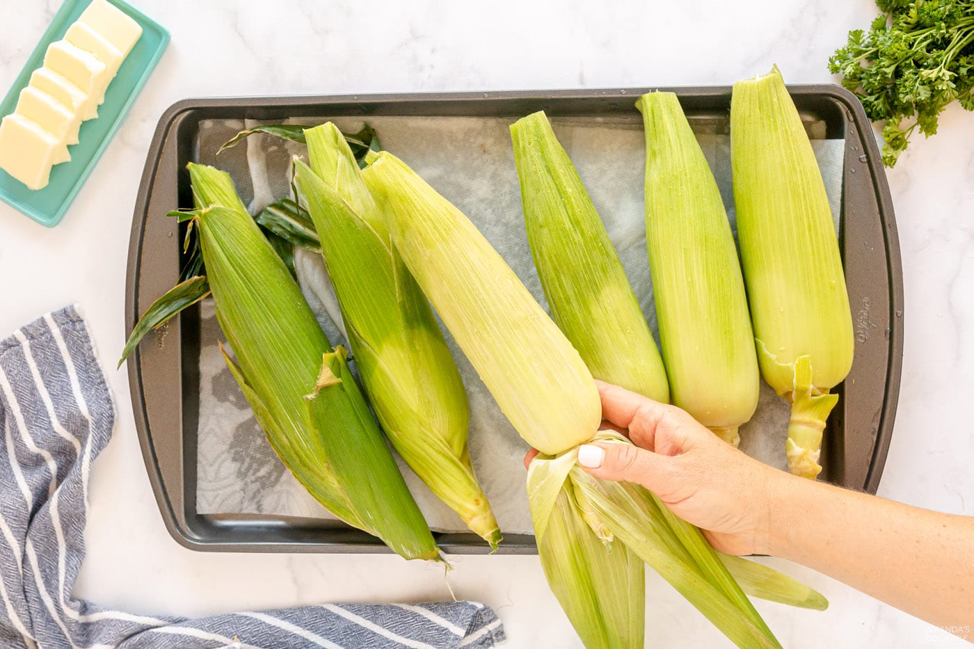 removing husks on corn
