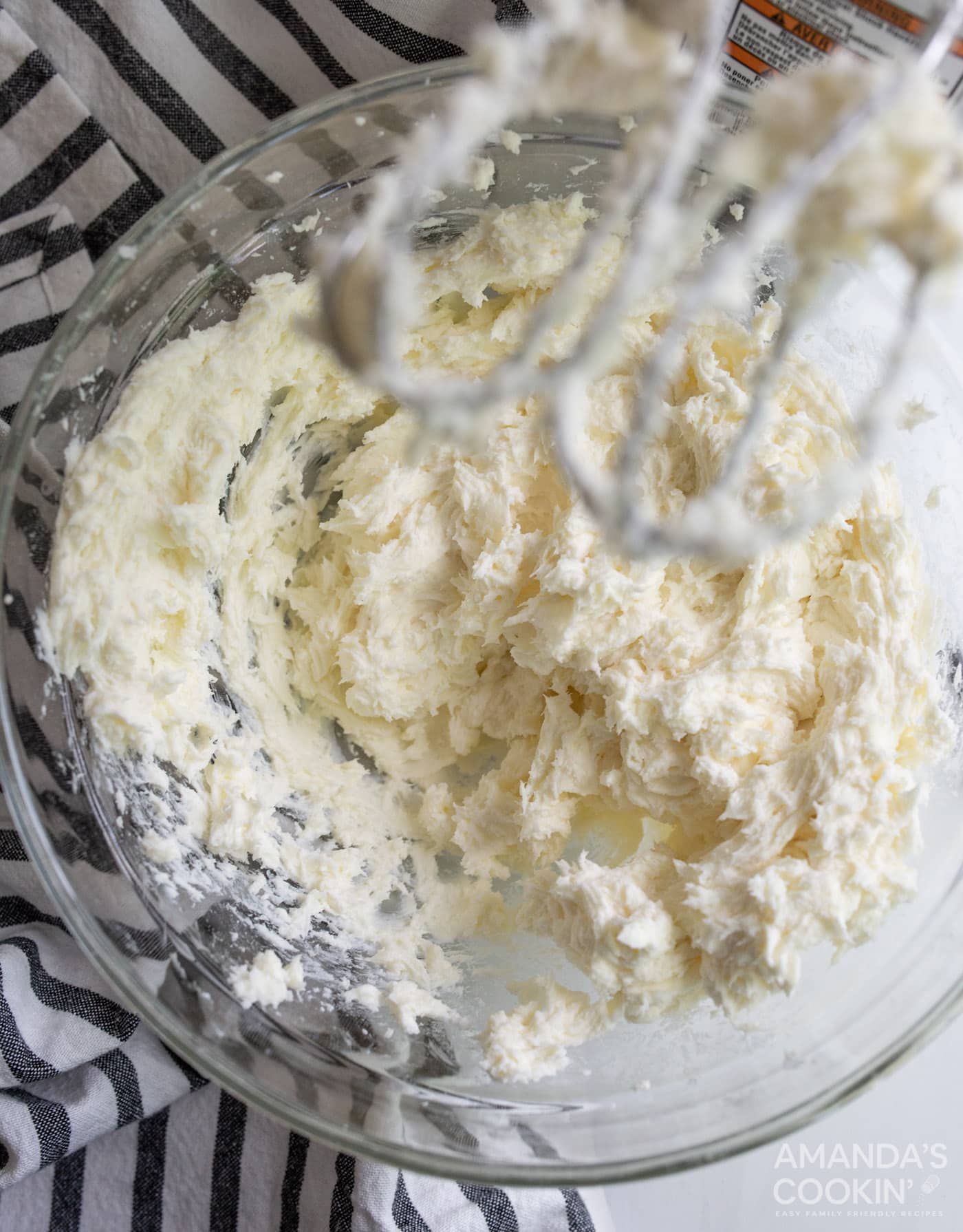 cream cheese, sugar, and flour mixed in bowl