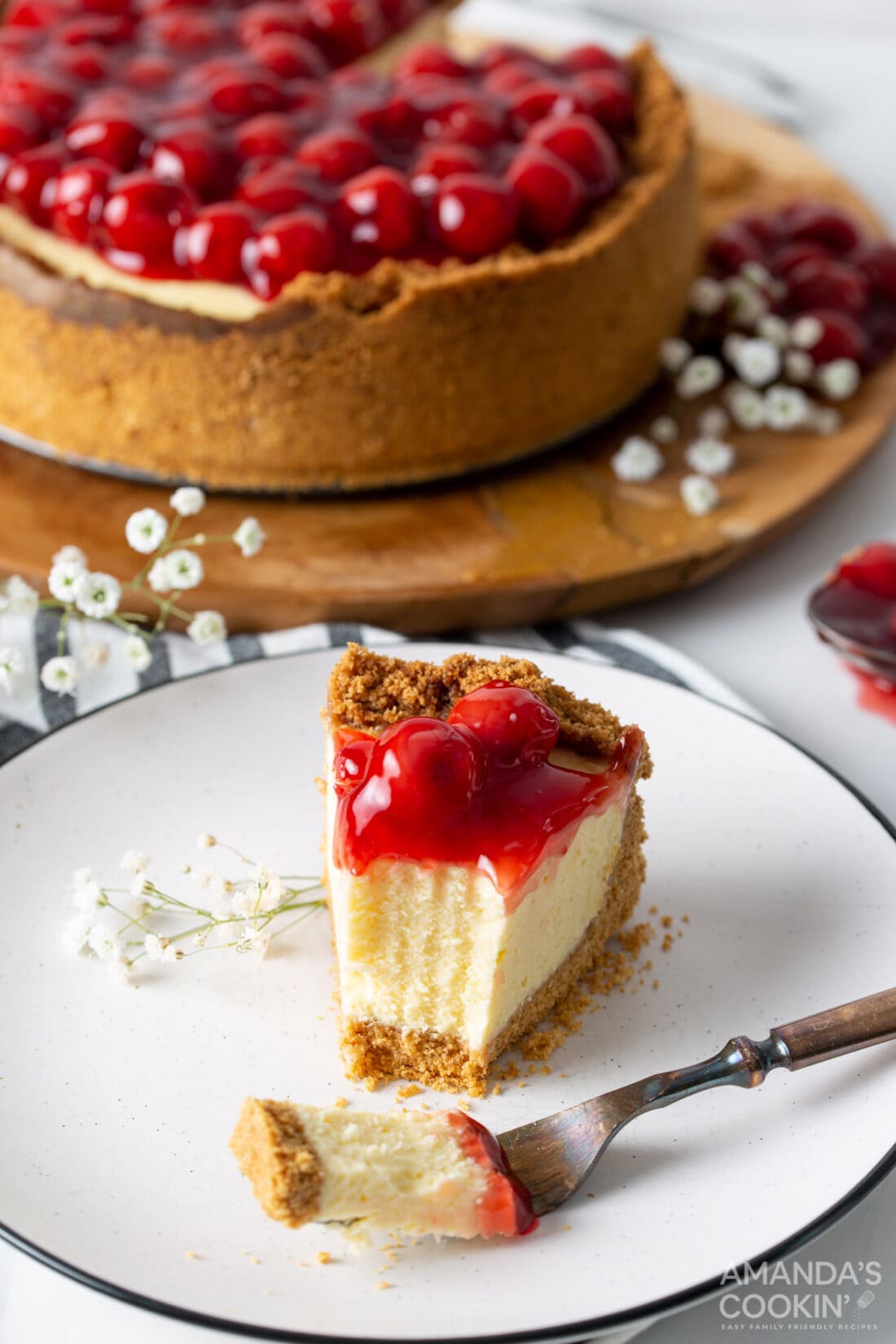 slice of instant pot cherry cheesecake with fork slice removed