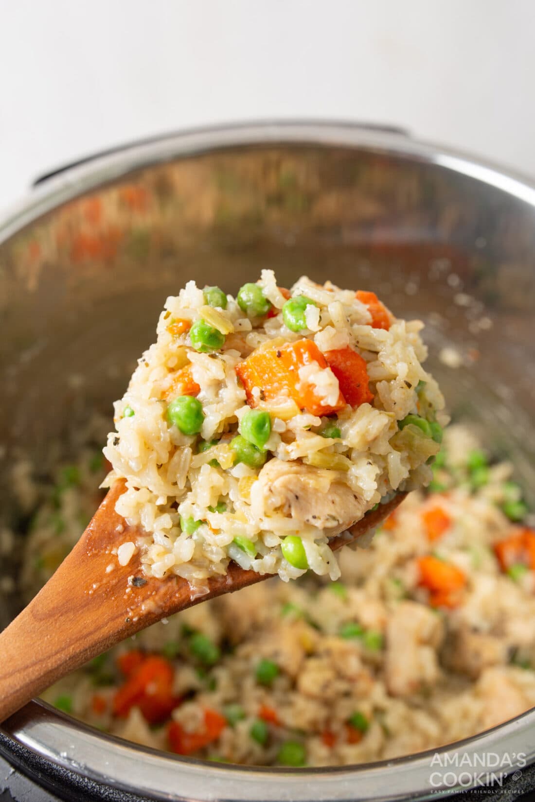 spoon of instant pot chicken and rice