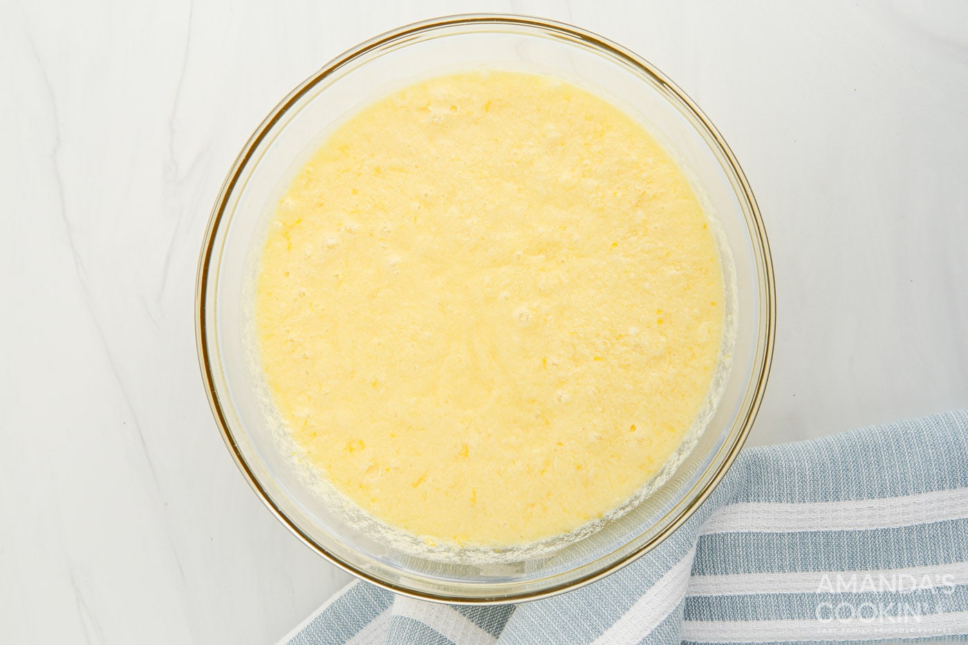 lemon curd mixture in a mixing bowl