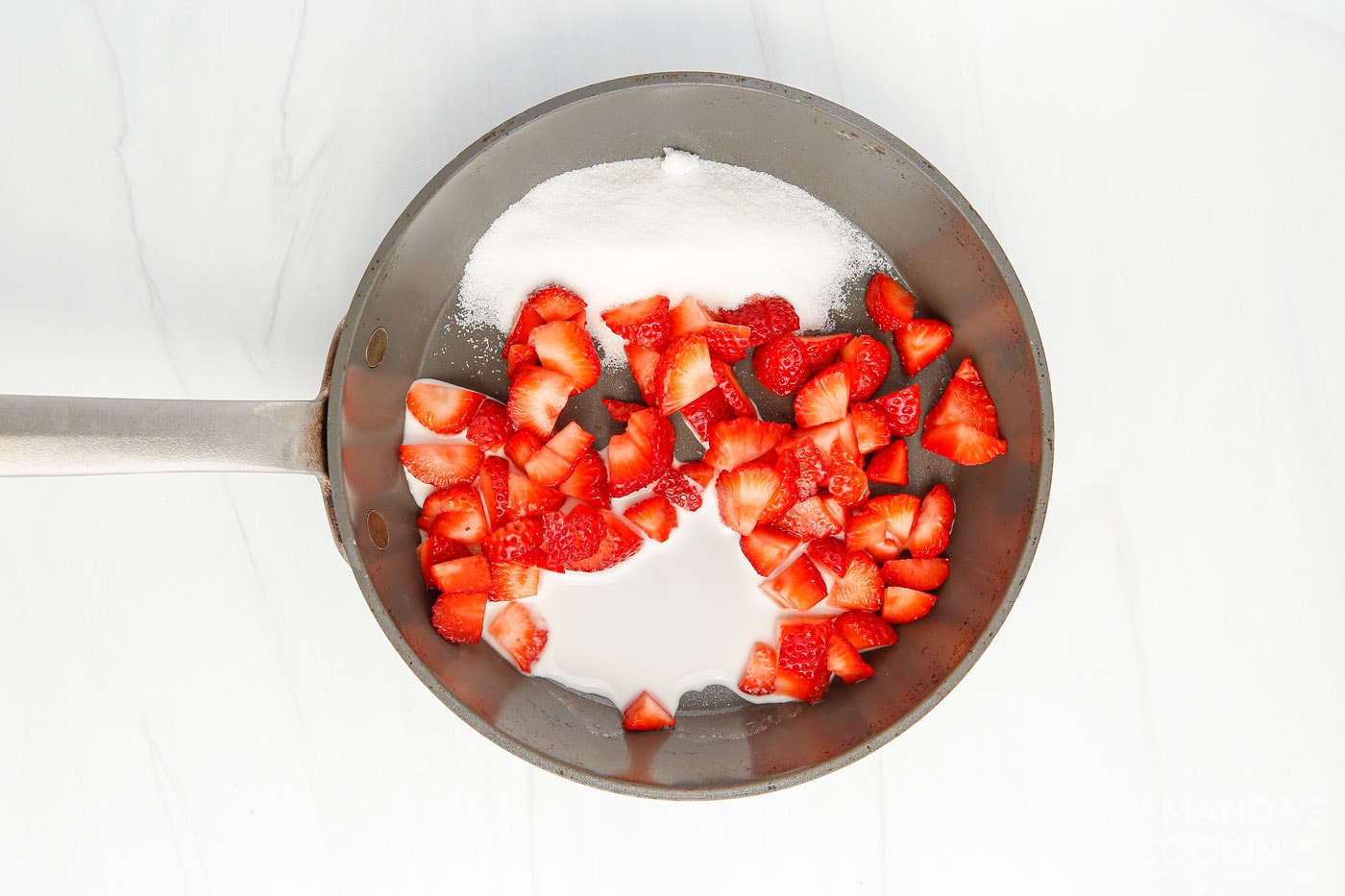 strawberries with sugar and cornstarch in a bowl